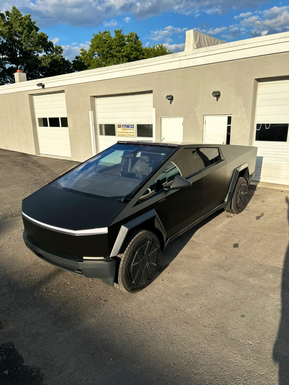 Wrap Estate - PPF | Car Vinyl Wrap | Paint Protection Film | Ceramic Coating | Window Tint | Commercial Vehicle workshop