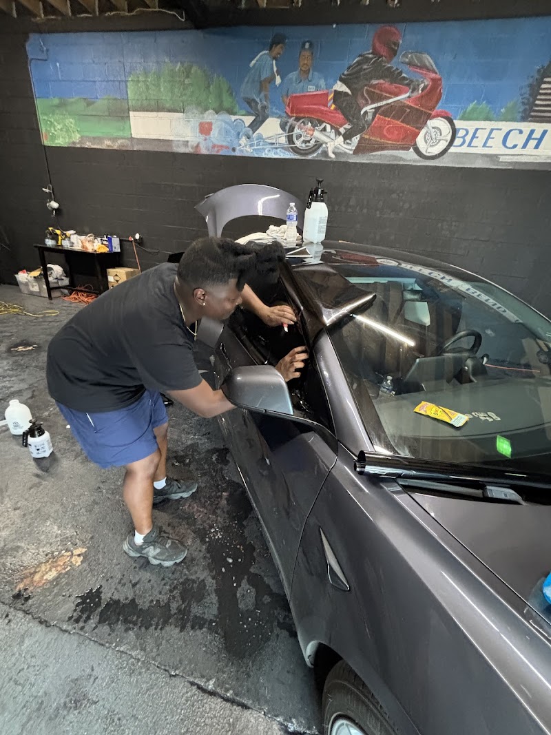 Vehicle wrap by Wrapman Global / Window Tints