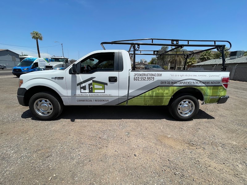 Vehicle wrap by 1st Impressions Truck Lettering