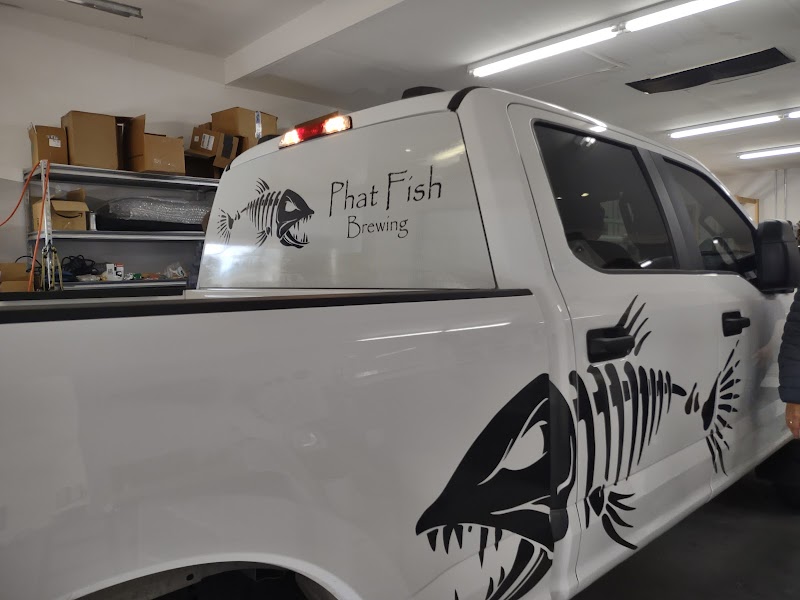 Vehicle wrap by Kelly's Signs