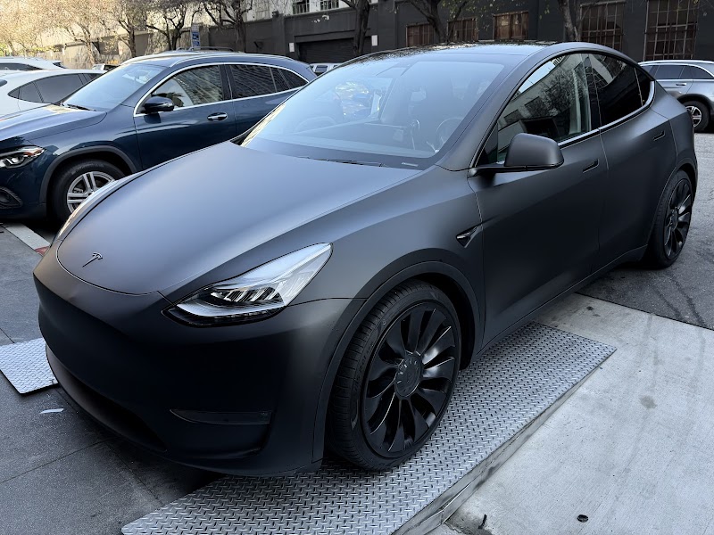 Vehicle wrap by Mcar PPF & Tint